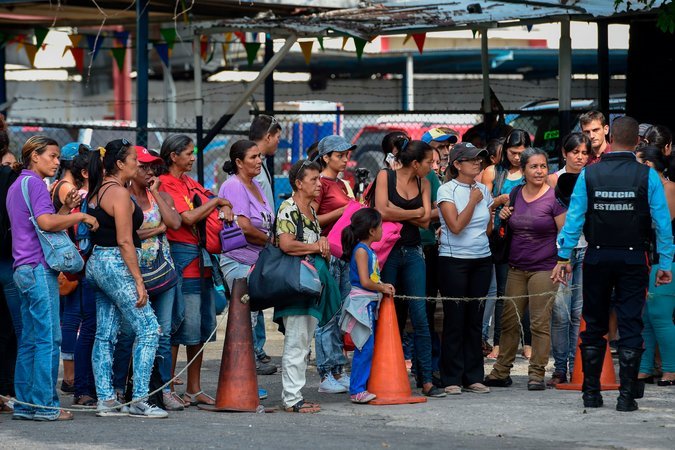 Relatives of prisoners waiting outside the police station where the fire broke out. Credit Juan Barreto/Agence France-Presse — Getty Images