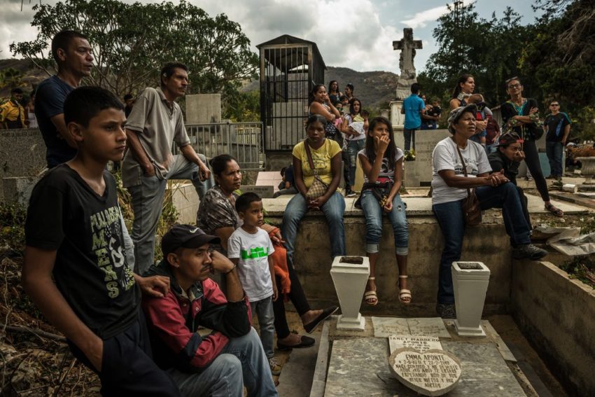 Friends of Mr. Contreras placed a radio at his grave, playing salsa and reggaeton music.
